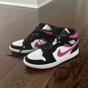Woman’s mid Jordan 1’s